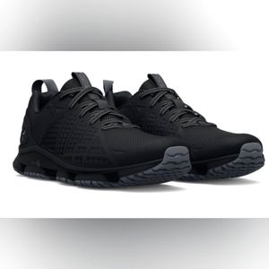 NWT Under Armour MG Strikefast Sneakers.